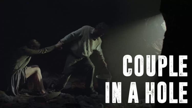Couple in a Hole Poster